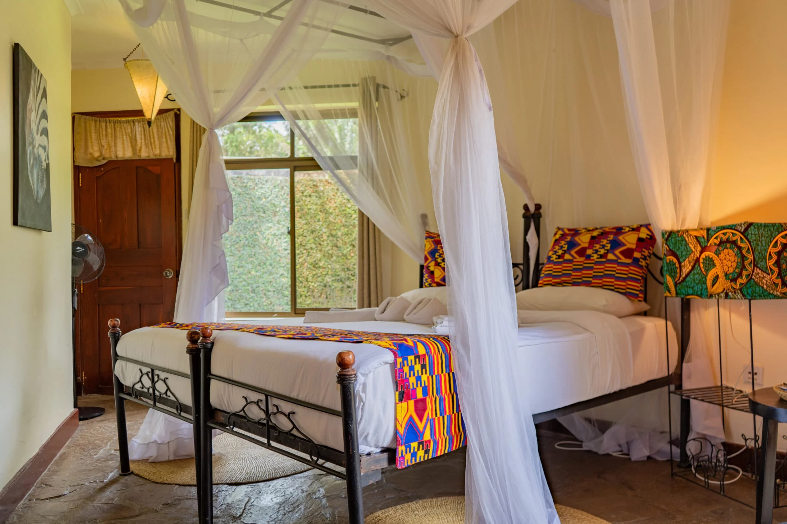 Canopy bed inside a safari lodge room